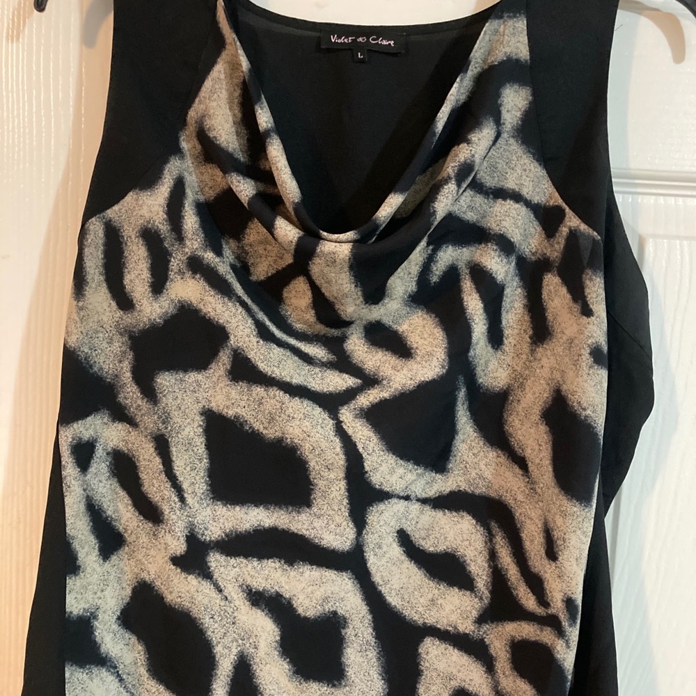 Perfect top for under a blazer or worn alone